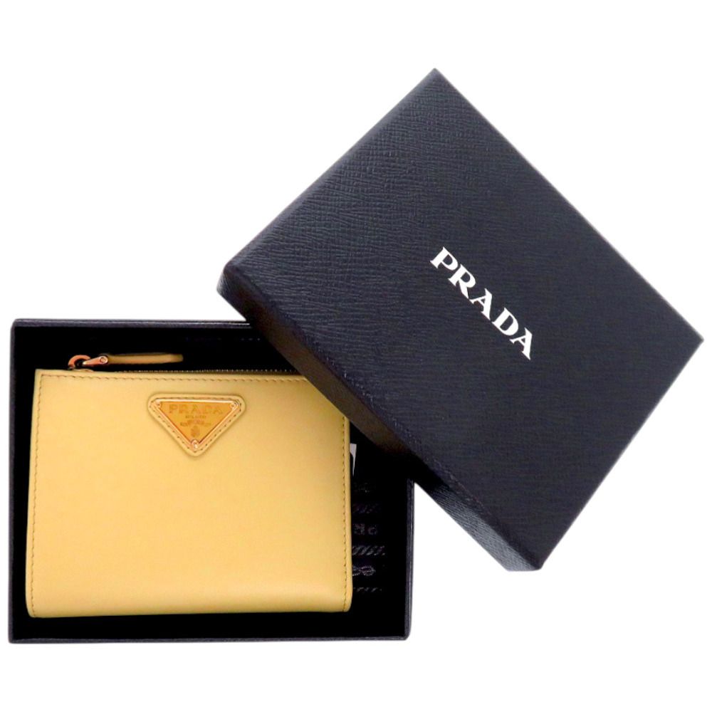 プラダ サフィアーノトライアングル 1ML050 QHH_F0032 牛革 バニラ 黄 二つ折り財布 0961 PRADA