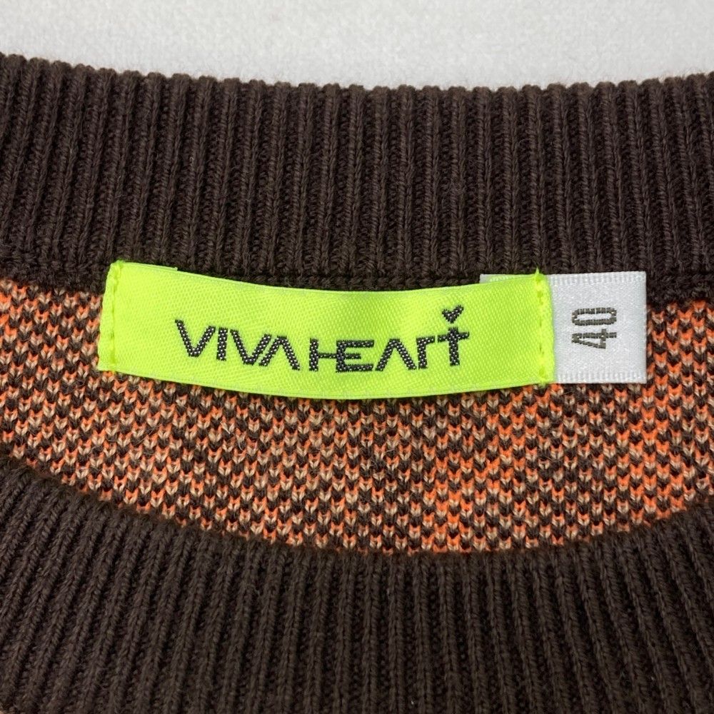 サイズ：40 VIVA HEART ビバハート ; 裏地付 ニットスカート ロゴ総柄 ブラウン系 [240101436123] ゴルフウェア レディース ストスト VIVA HEART ビバハート ; 裏地付 ニットスカート ロゴ総柄