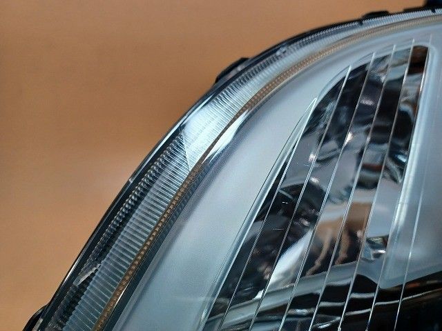 コーティング済 ヴィッツ NCP95 左ヘッドランプ・ヘッドライト F 4WD  