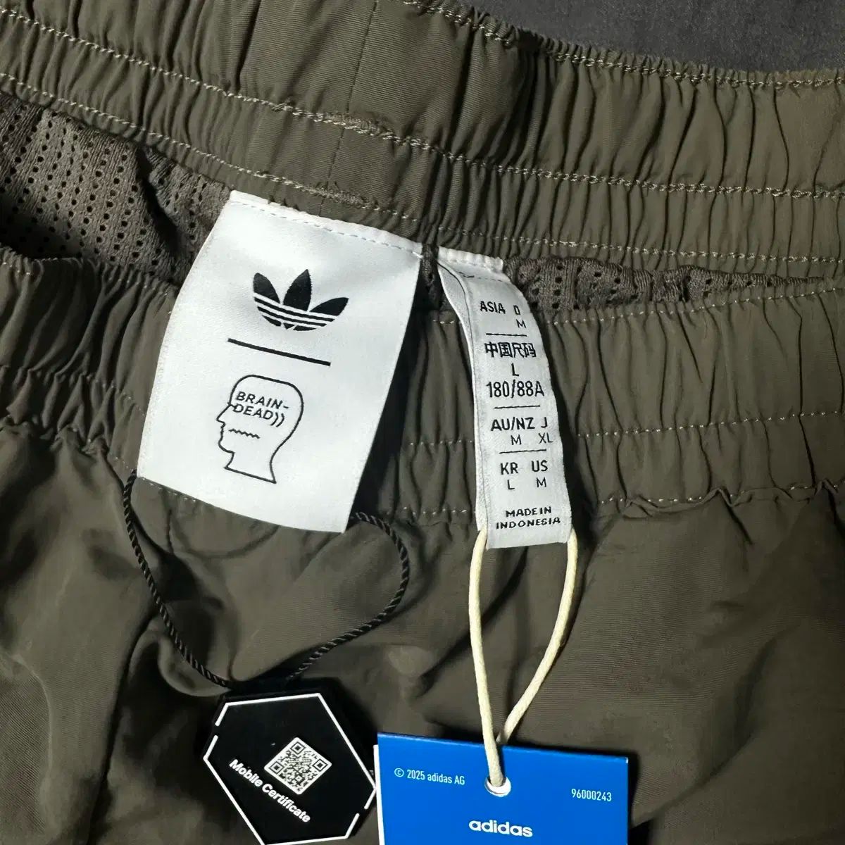 トラックパンツ L