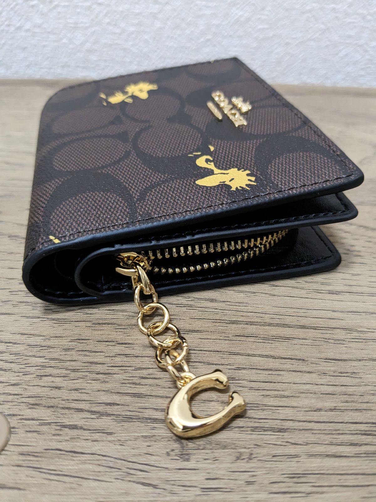 ☆新品未使用☆ COACH×PEANUTS ウッドストック 折りたたみ財布 - メルカリ