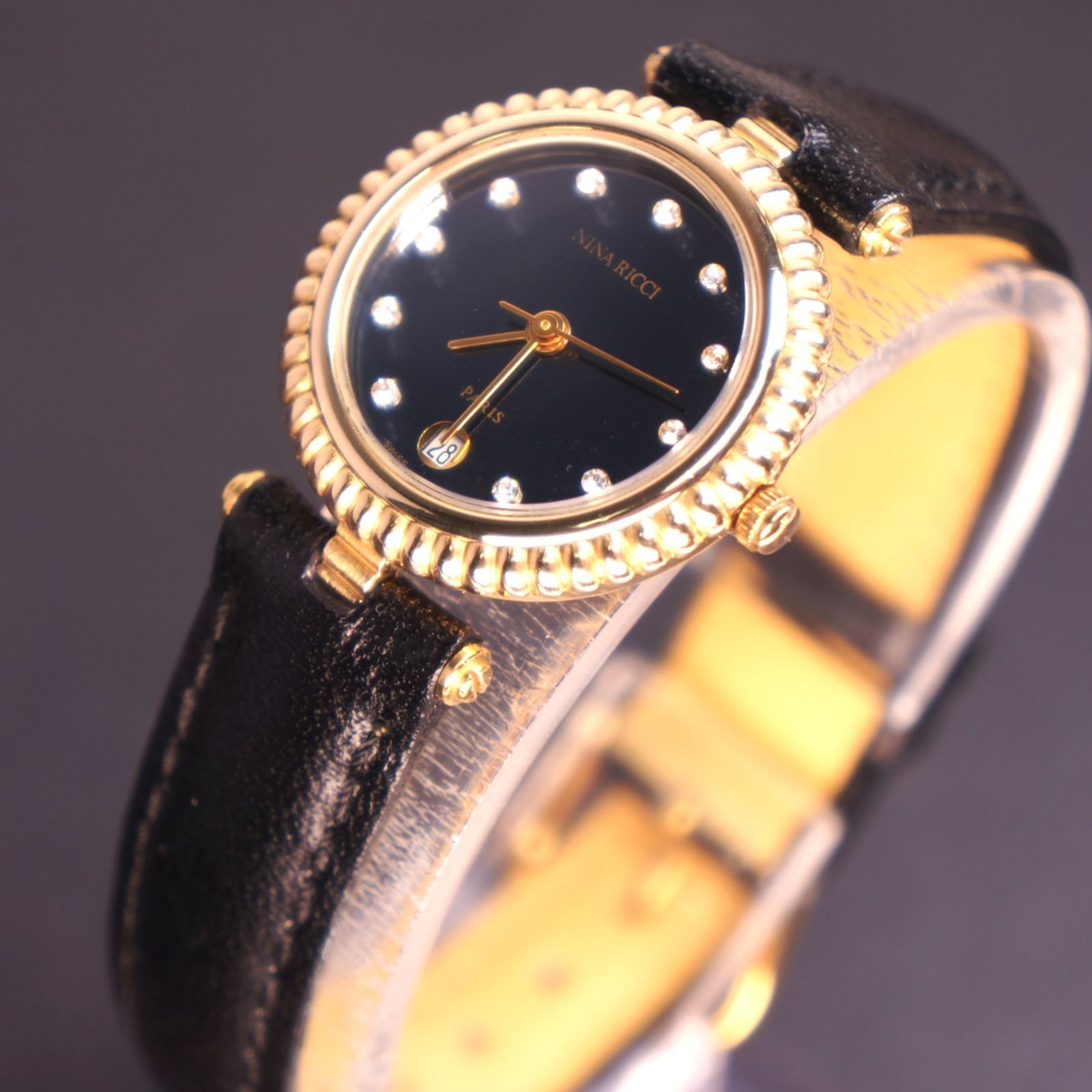 稼働 NINA RICCI 11P石付き ネイビー文字盤 レディース腕時計 ベルト 電池交換済