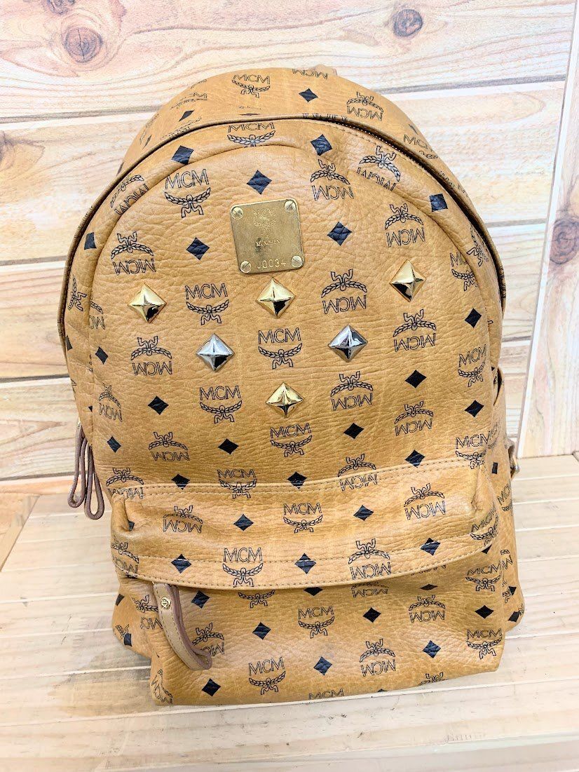 MCM ロゴグラムスタッズ バックパック リュック レザー CML 総柄