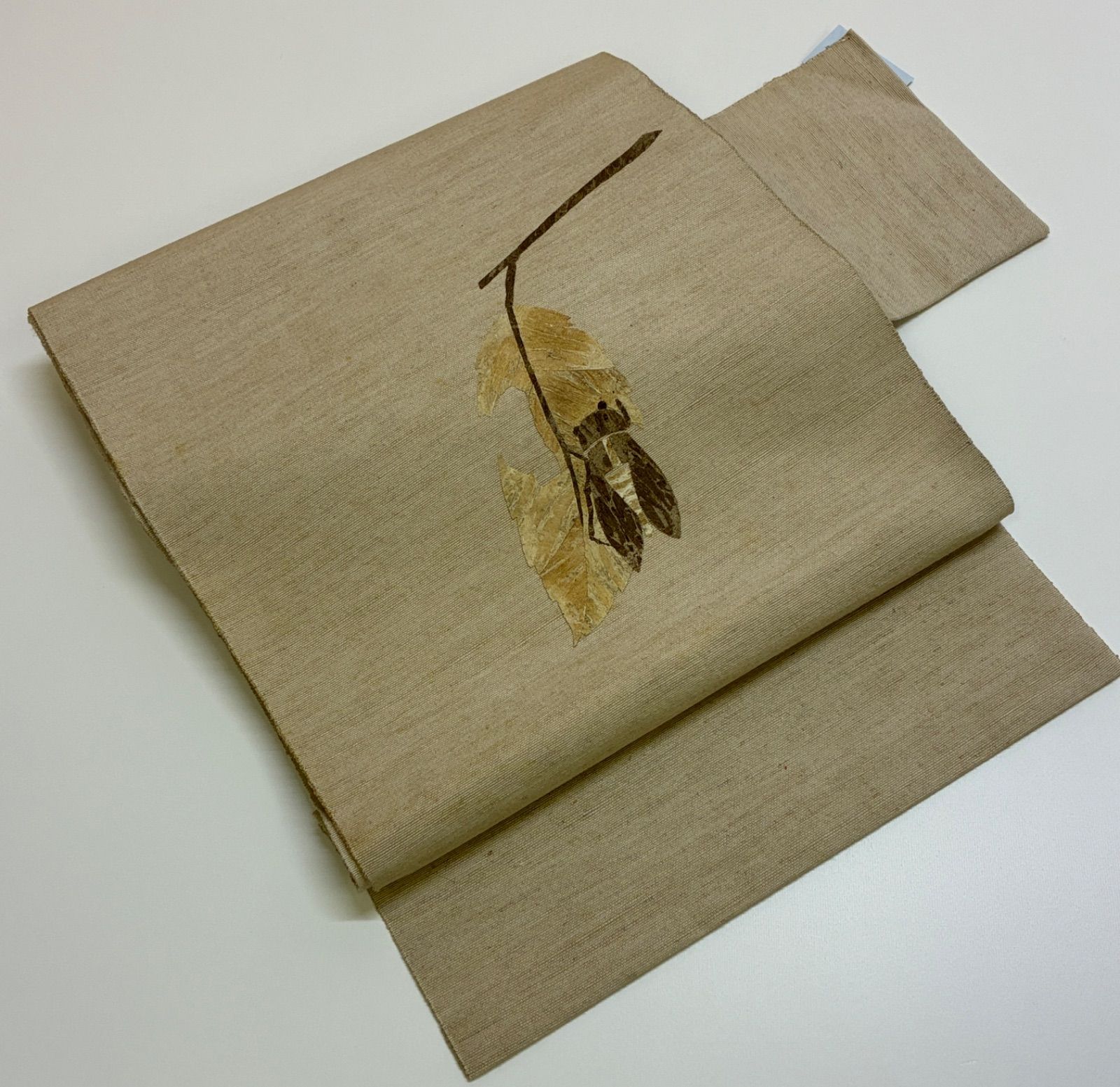 紬の八寸名古屋帯 蓑虫 葉っぱに蝉