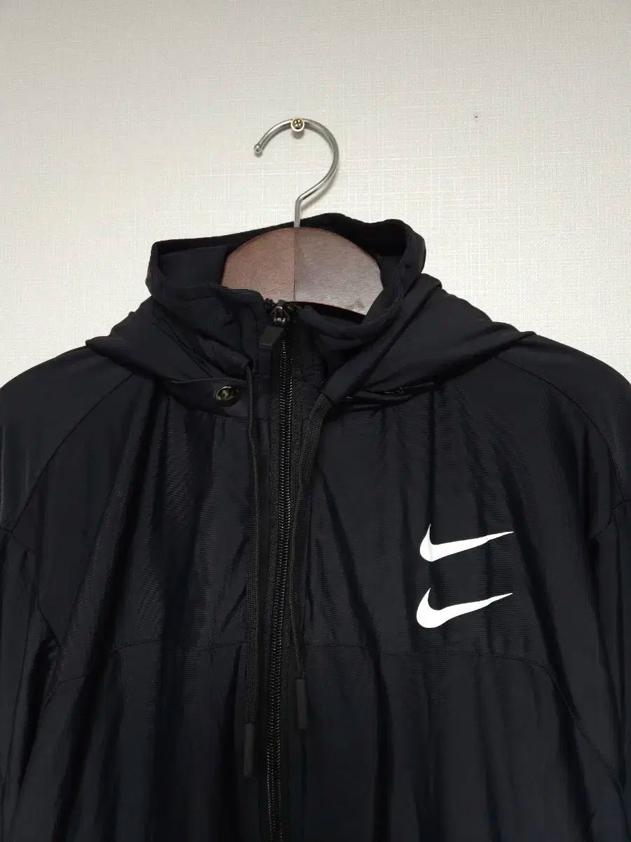 ナイキ ダブルスウッシュ フーデッドジップアップ ウィンドブレーカー 100 L