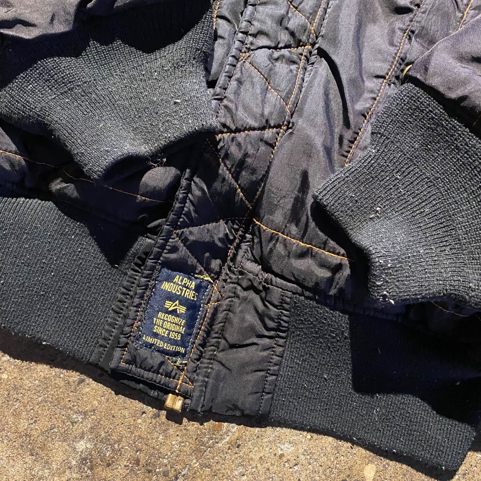 COMME des GARCONS black market × ALPHA ロゴパッチ MA-1 ジャケット