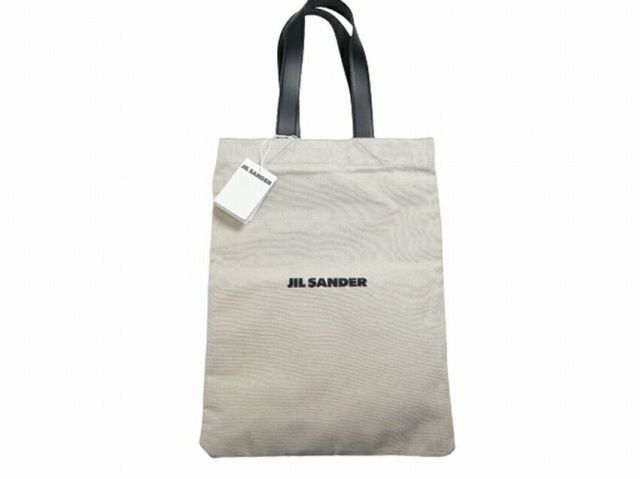 【JIL SANDER/ジルサンダー/ JSPT852457 WTB73003N FLAT SHOPPER GRANDE/フラットショッパー バッグ/キャンバストートバッグ ロゴ/TOTE BAG/持ち手 レザー製/レディースですがメンズも着用可/102/アイ