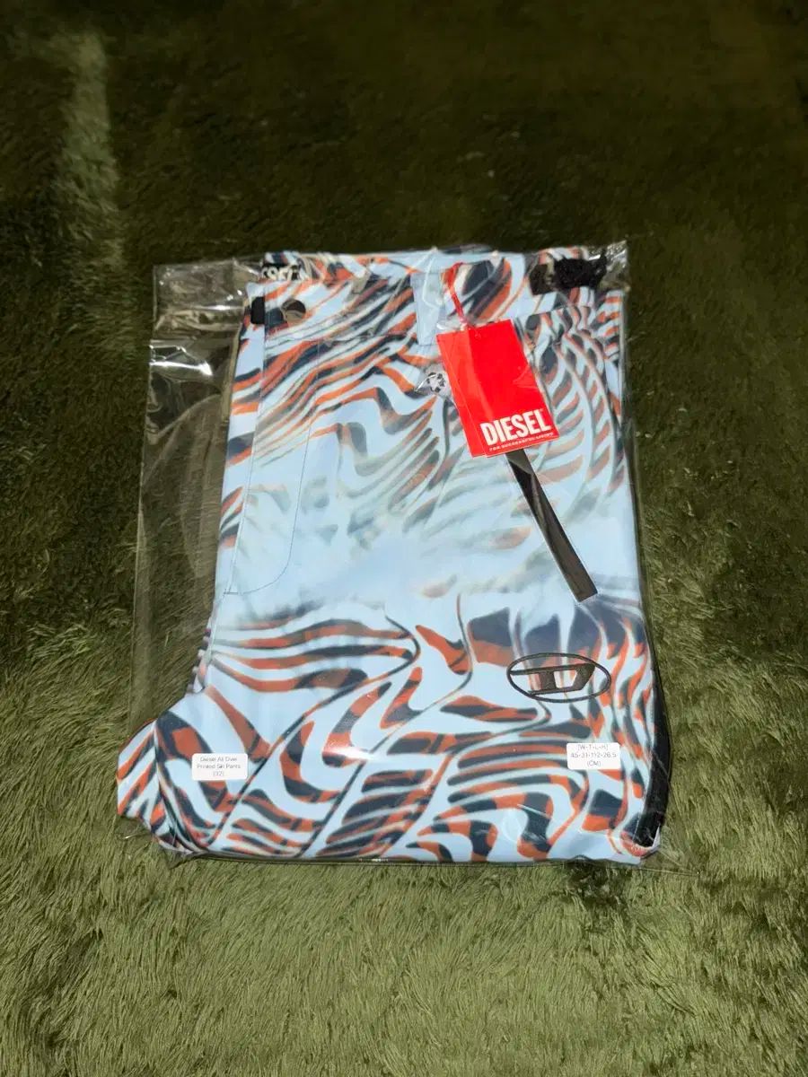  32 ディーゼル オプティカル グラフィック エンブロイダリー ロゴ ブーツカット パンツ ブルー チノパン パンツ