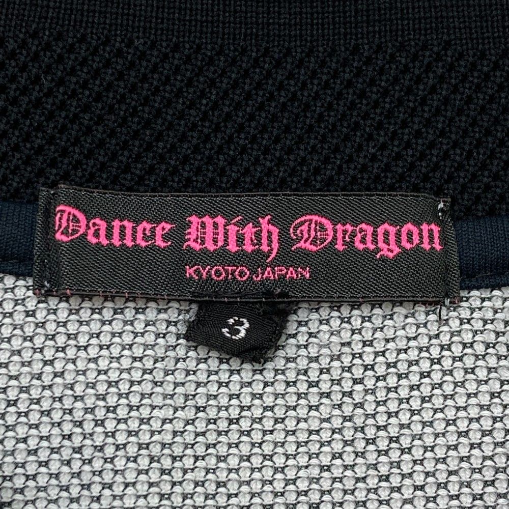サイズ：3 DANCE WITH DRAGON ダンスウィズドラゴン  ハーフジップ半袖ポロシャツ 総柄 ホワイト系 [240101378766] ゴルフウェア レディース ストスト サイズ：3 DANCE WITH DRAGON ダンスウィズドラゴン ハーフジップ 半袖