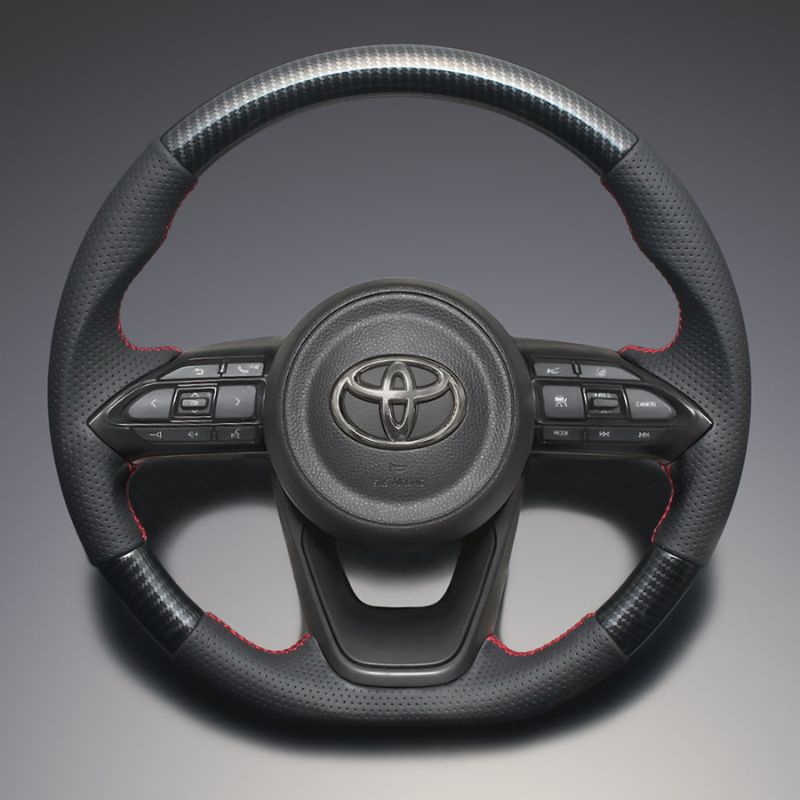 高品質の証ユーロステッチ採用 カーボン調xレッドステッチ 純正交換ガングリップステアリング ヤリス MXP10系 R2 2- LS196