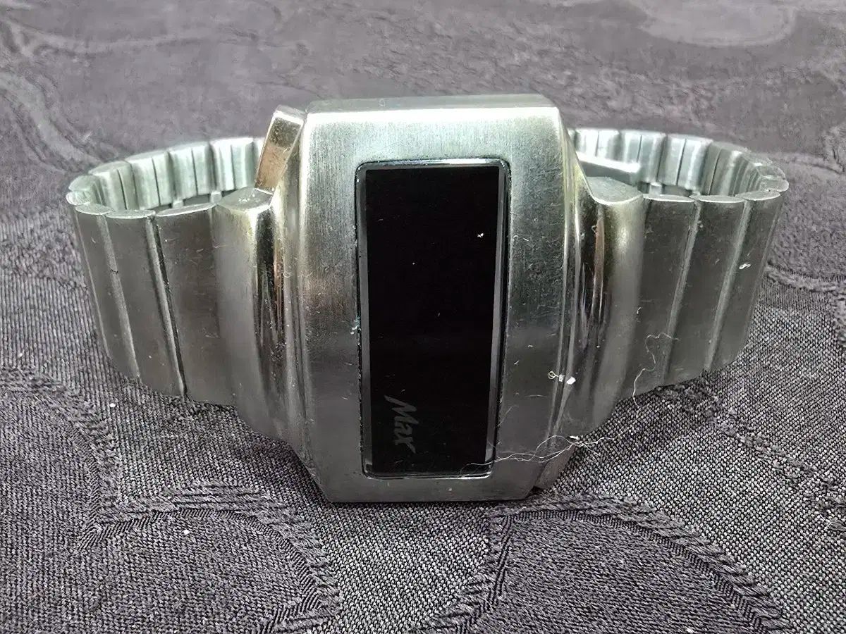 ヴィンテージ メタル時計