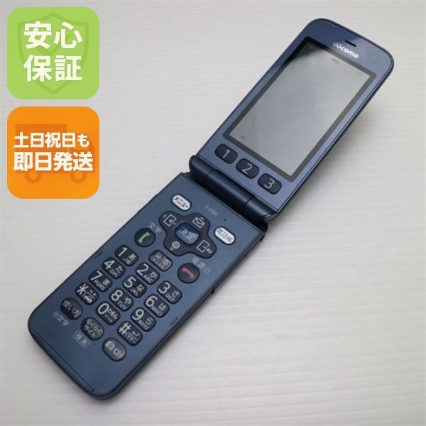 超 F-01M ネイビー スマホ 本体 白ロム 土日祝発送OK 09000