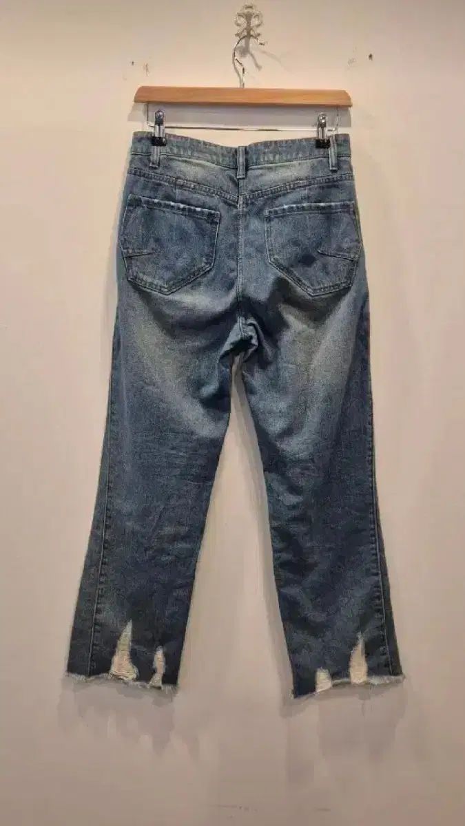 タイムダメージカッティングデニムパンツ