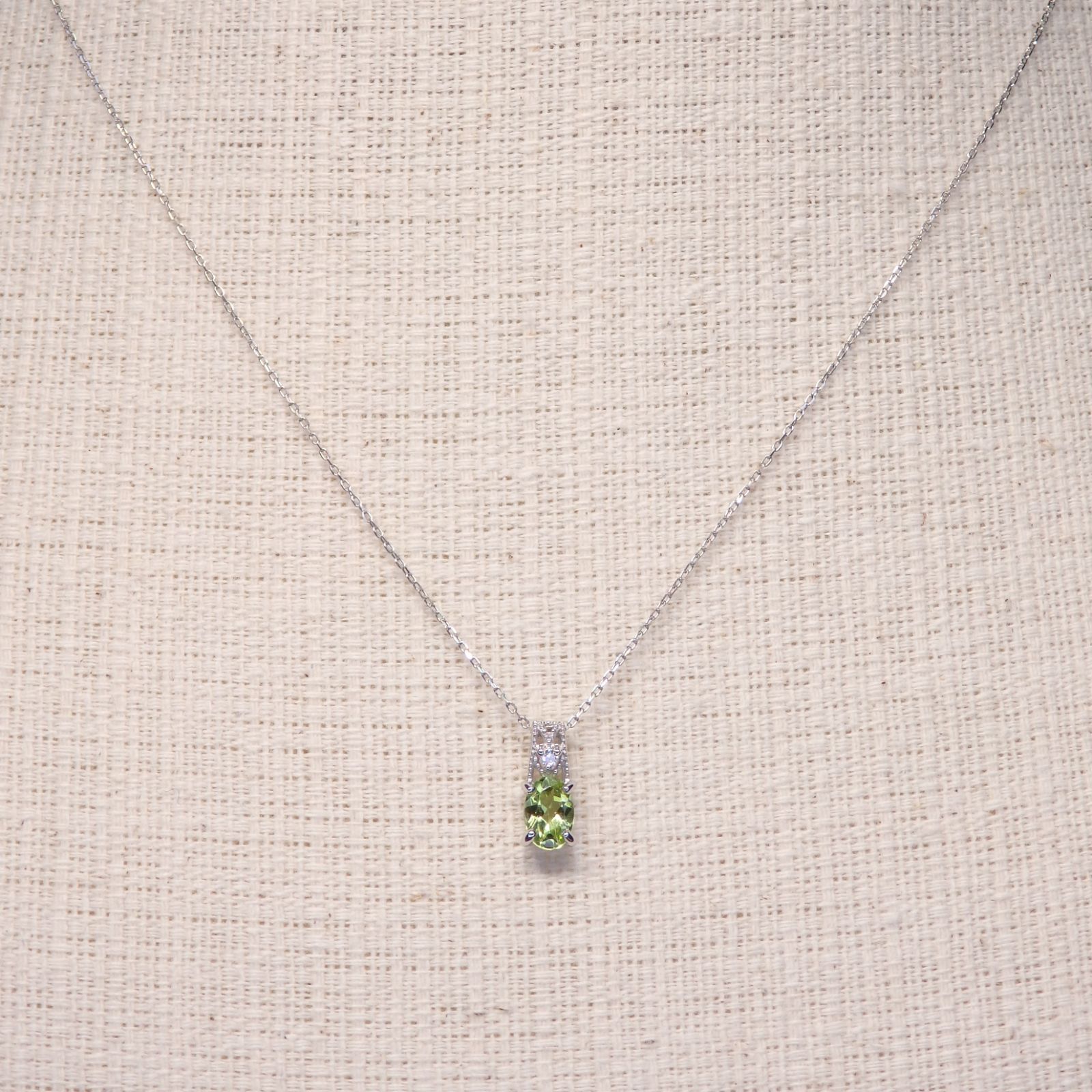ペリドット ペンダントTOP Z5774 0.43ct プラチナPt オーバル小判