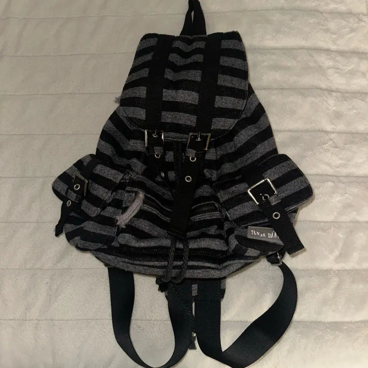 タンストゥダンス パヒ島 テン TEN ウール ストライプ バックパック ブラック 正規品