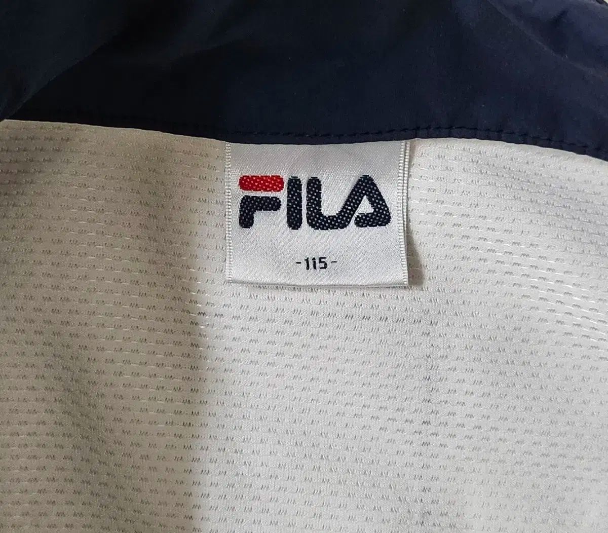 フィラ ハーフジップ