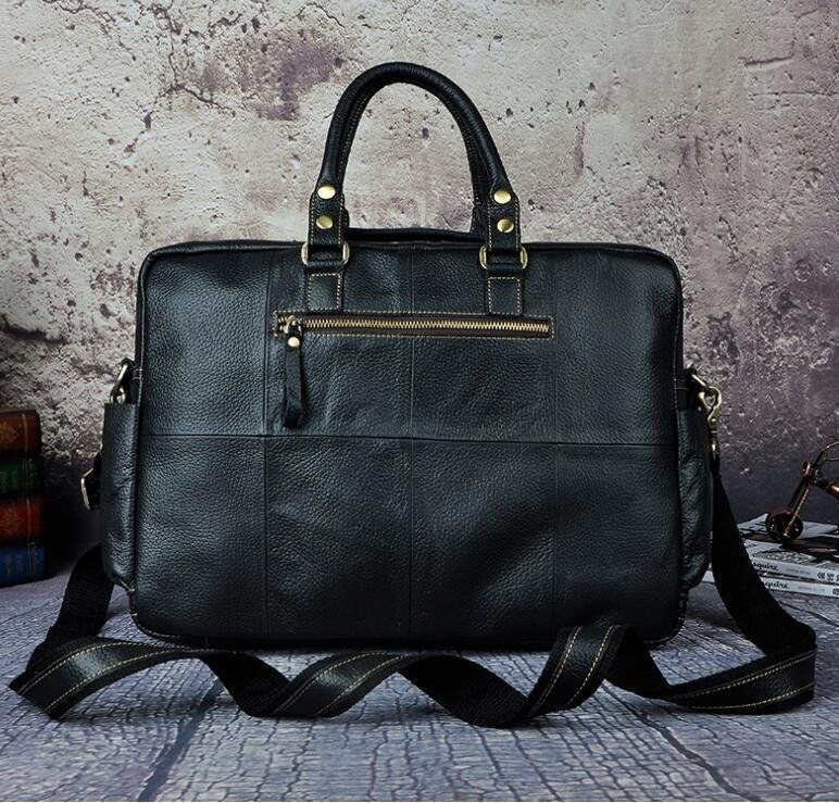 牛革男性の16インチ覇気大容量携帯公文書パソコンバッグ