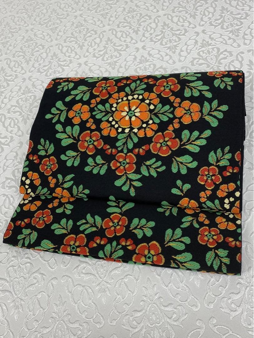 たつむら 龍村美術織物 本袋帯 未仕立て品 彩絵唐花文 正絹 六通 黒地