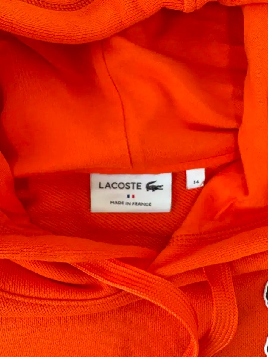  ラコステ オレンジ フードTシャツ パーカー トップス