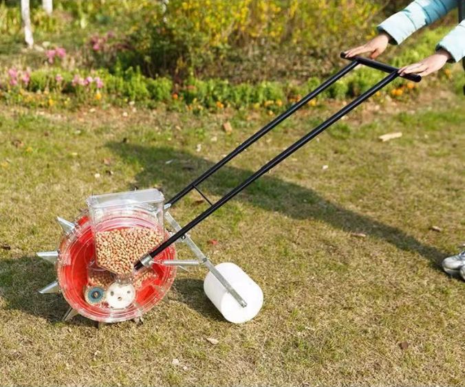 大好評 手動播種機 プランター トウモロコシ落花生大豆綿押し播種機 耐久性のあるステンレススチールハンドル 圧力ホイール付き12口10〜4個口に調整