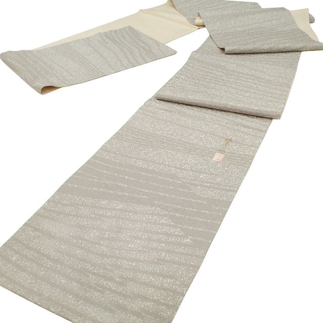 新古品 袋帯 正絹 柿本伝次郎 染め帯 全通 落款有り 手染め グレージュ 波線 金通し 上質 カジュアル 春 秋 冬 染帯 仕立て上がり みやがわ sb54663