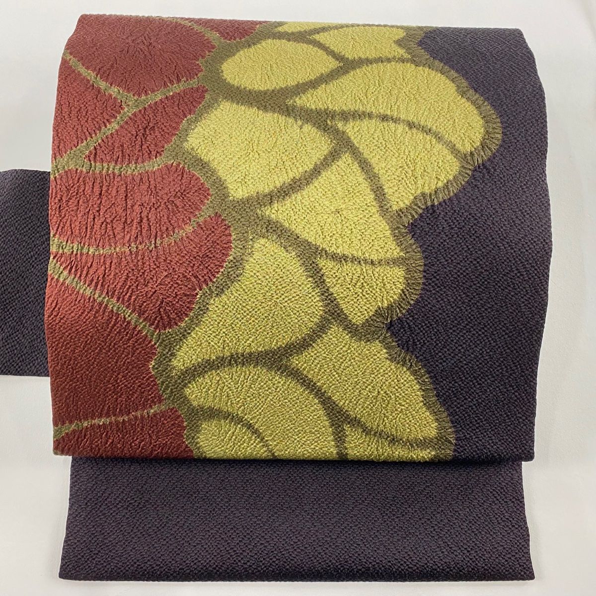 名古屋帯 秀品 幾何学模様 絞り 縮緬 墨色 正絹