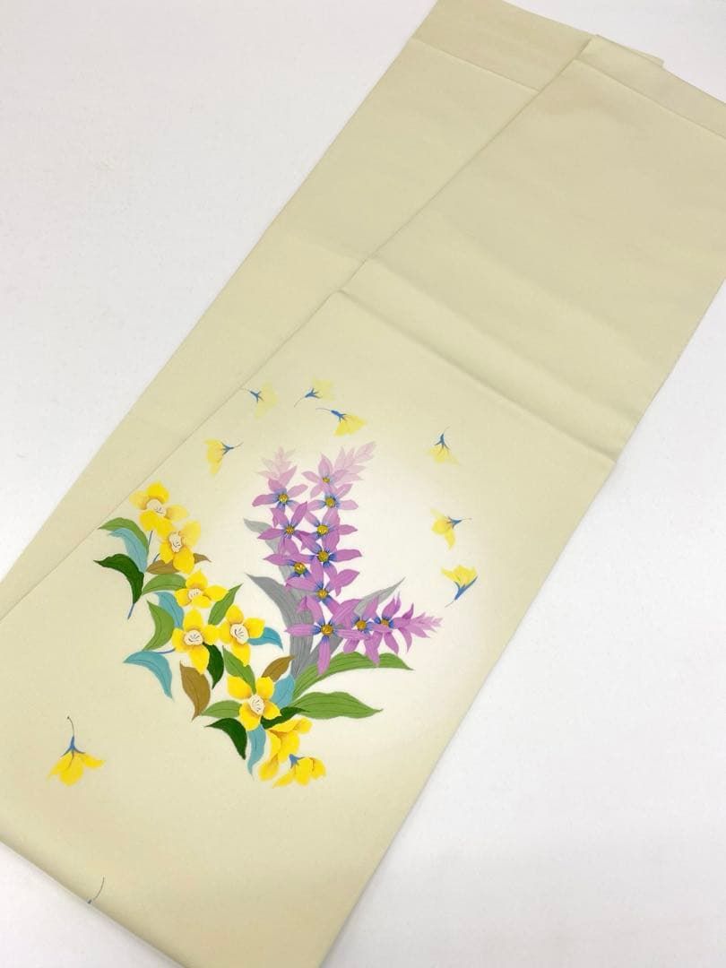 値引き。全通袋帯。友禅たたき染め。お太鼓のタレにワンポイントの刺繍