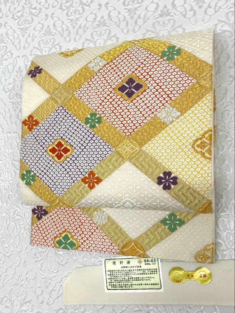 西陣 藤原織物 唐織 六通柄 アイボリー 菱文様 袋帯 極美品 京都西陣織：藤原織物謹製」 唐織の名門 金色系 煌びやかな引箔 正倉院