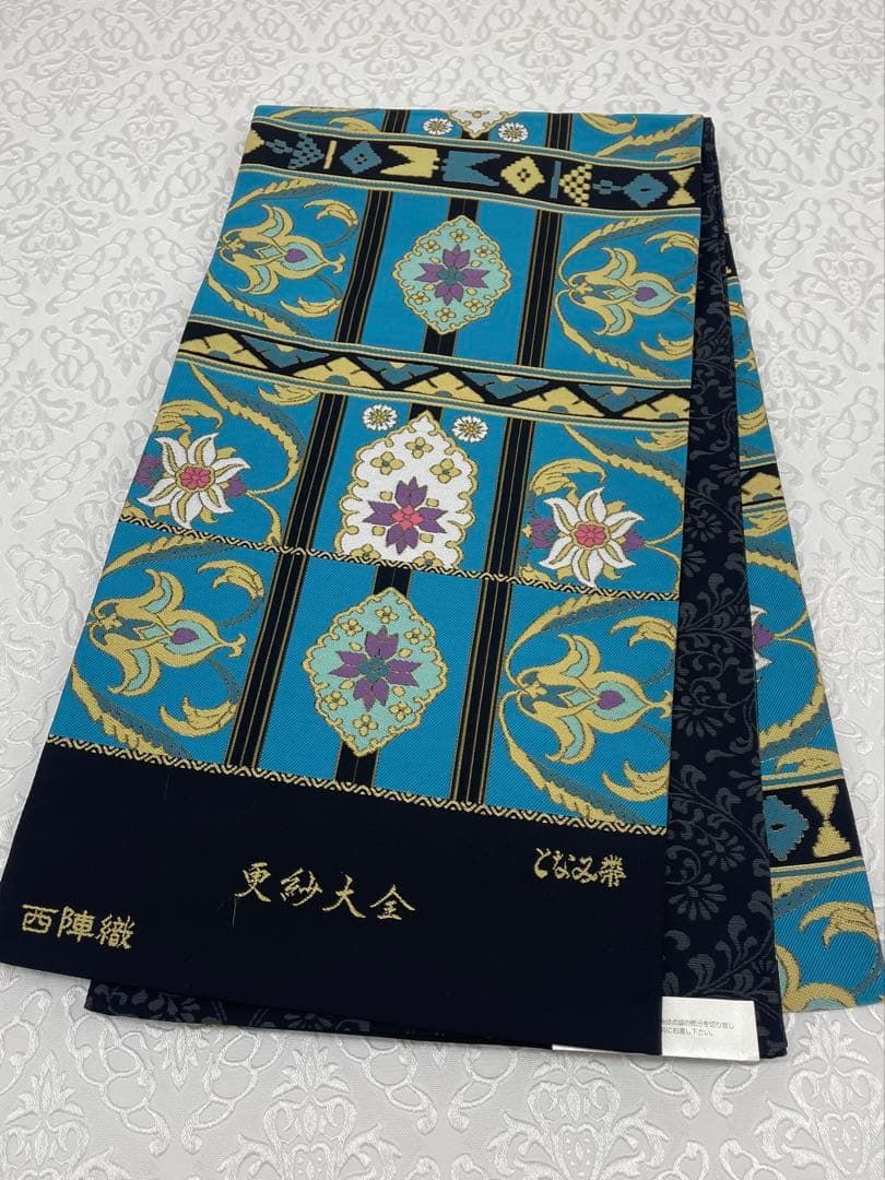となみ帯 西陣織 袋帯 未仕立て品 更紗大全 金糸 正絹 六通 - メルカリ