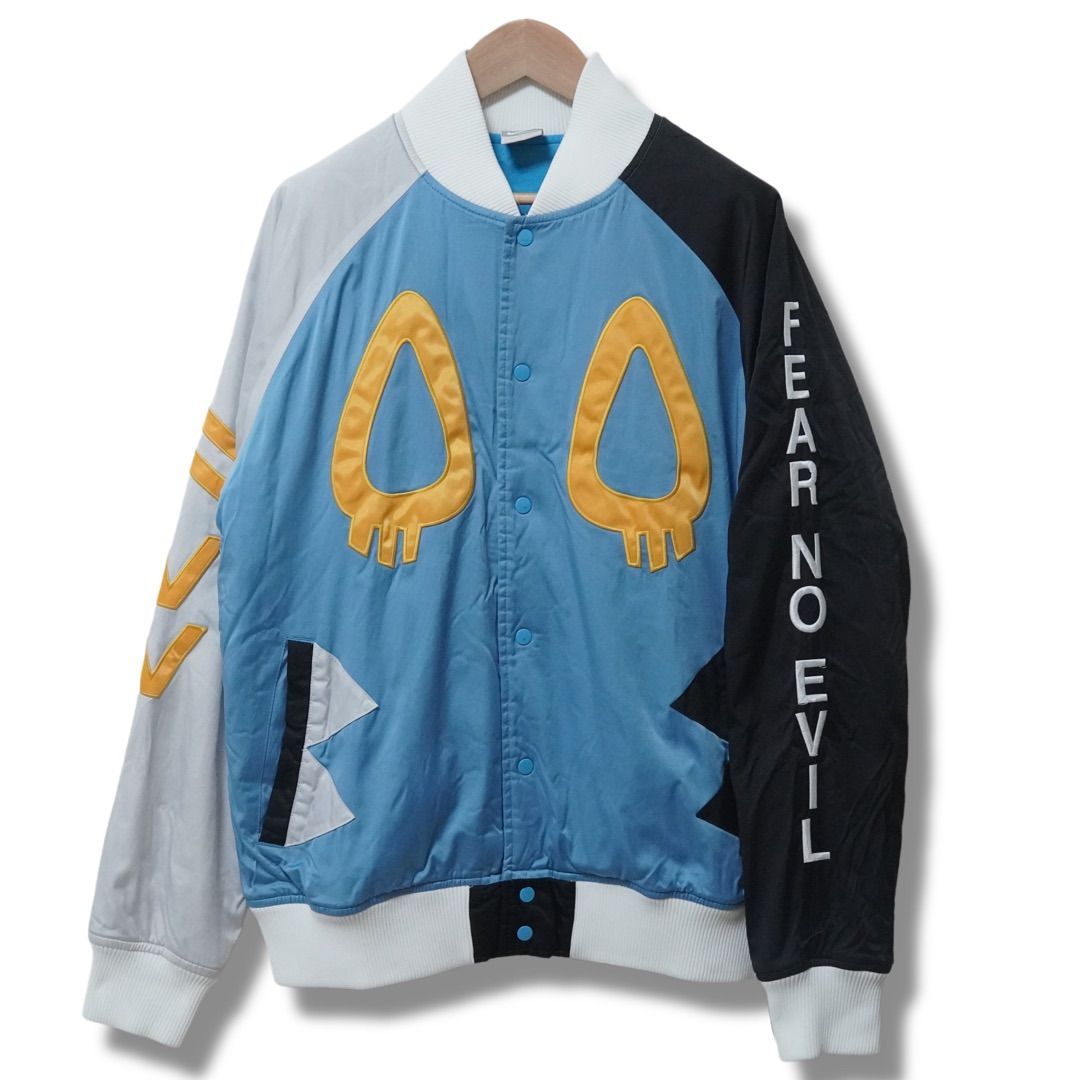 NIKE × CASSETTEPLAYA コラボ ナイロンジャケット M 2009年製 00s ブルー スタジアムジャケット スタジャン ストリート Y2K クレイジーパターン 刺繍ロゴ バックプリント ナイキ カセットプレイヤ ナイロン 古着 N3070