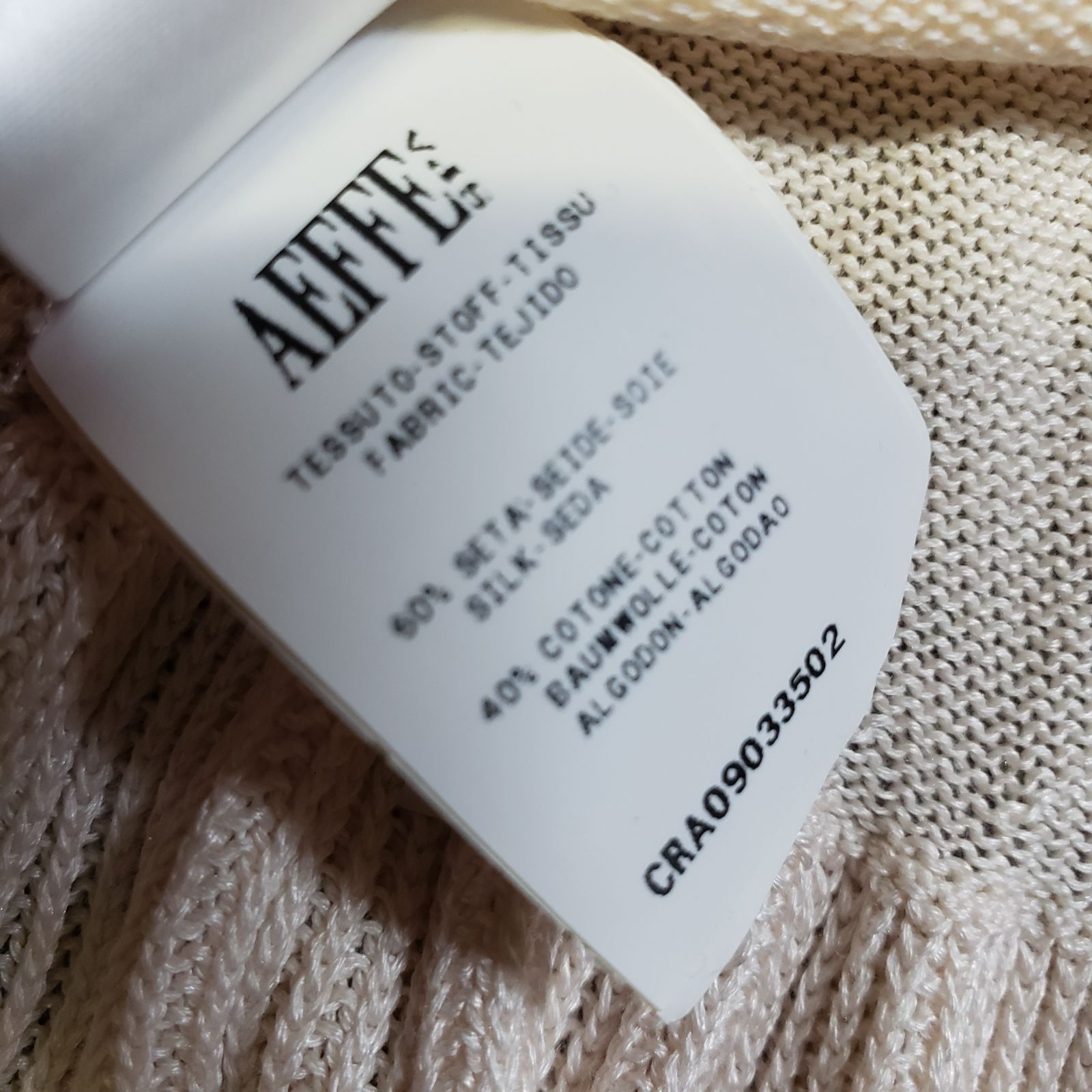 シルクコットン ペプラムニットトップス