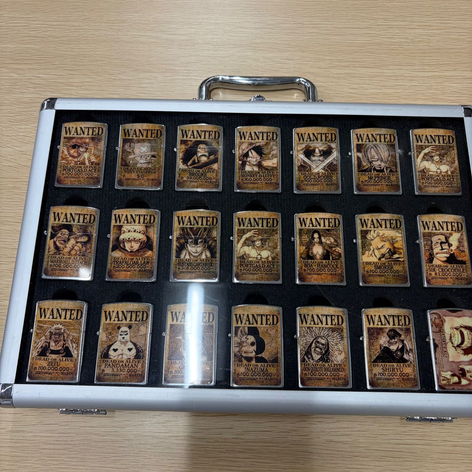 ワンピース　zippo風 手配書オイルライター まとめ売り ワンピース 手配書 Zippo風オイルライター 25個セット - メルカリ