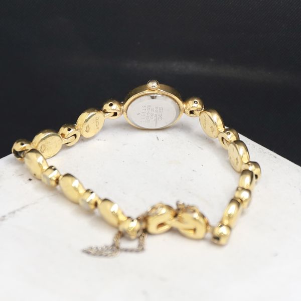 SEIKO セイコー 石付き クォーツ ゴールド文字盤 1E20-0420 QZ