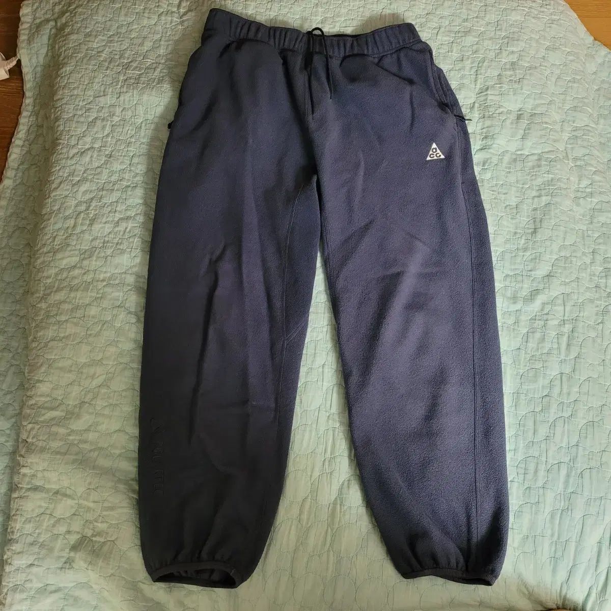 ナイキ ACG ポーラテック ウルフ ツリー パンツ サンダー ブルー アジア