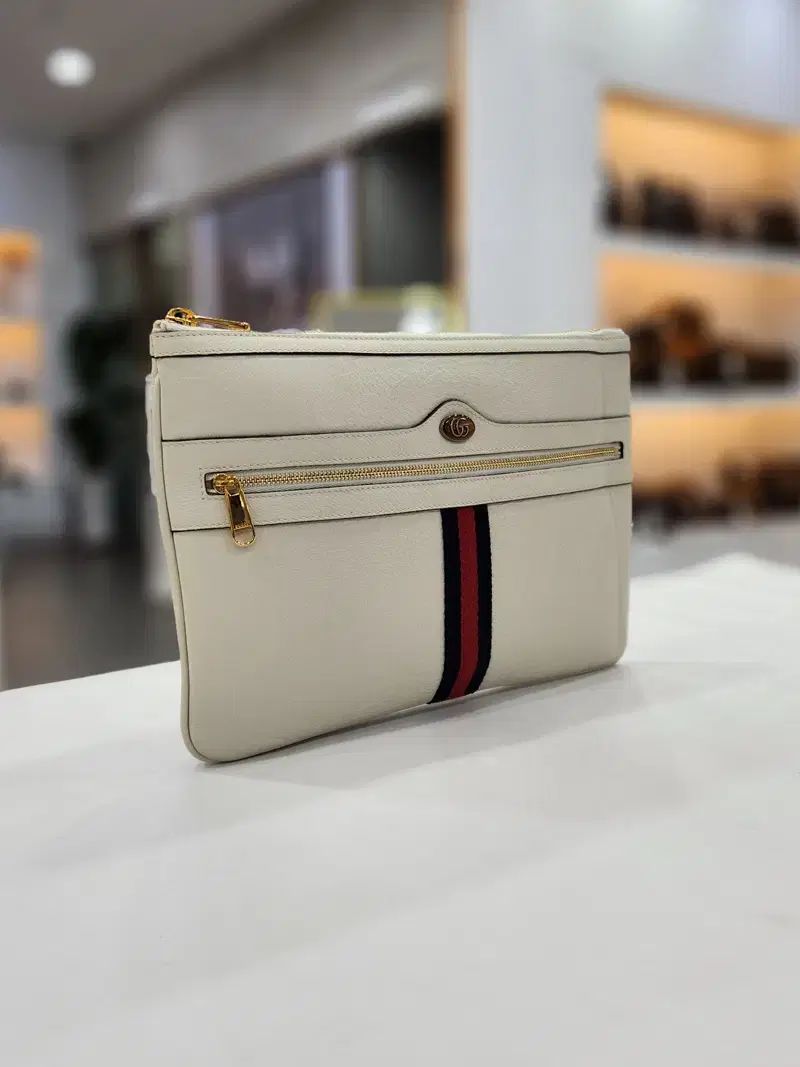 グッチ gg Supreme オフィディア 3本線クラッチバッグ 白 517551