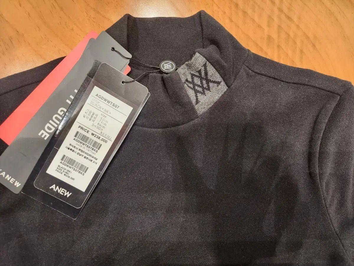 アニューゴルフ レディース ブラック 起毛 ハイネック Tシャツ