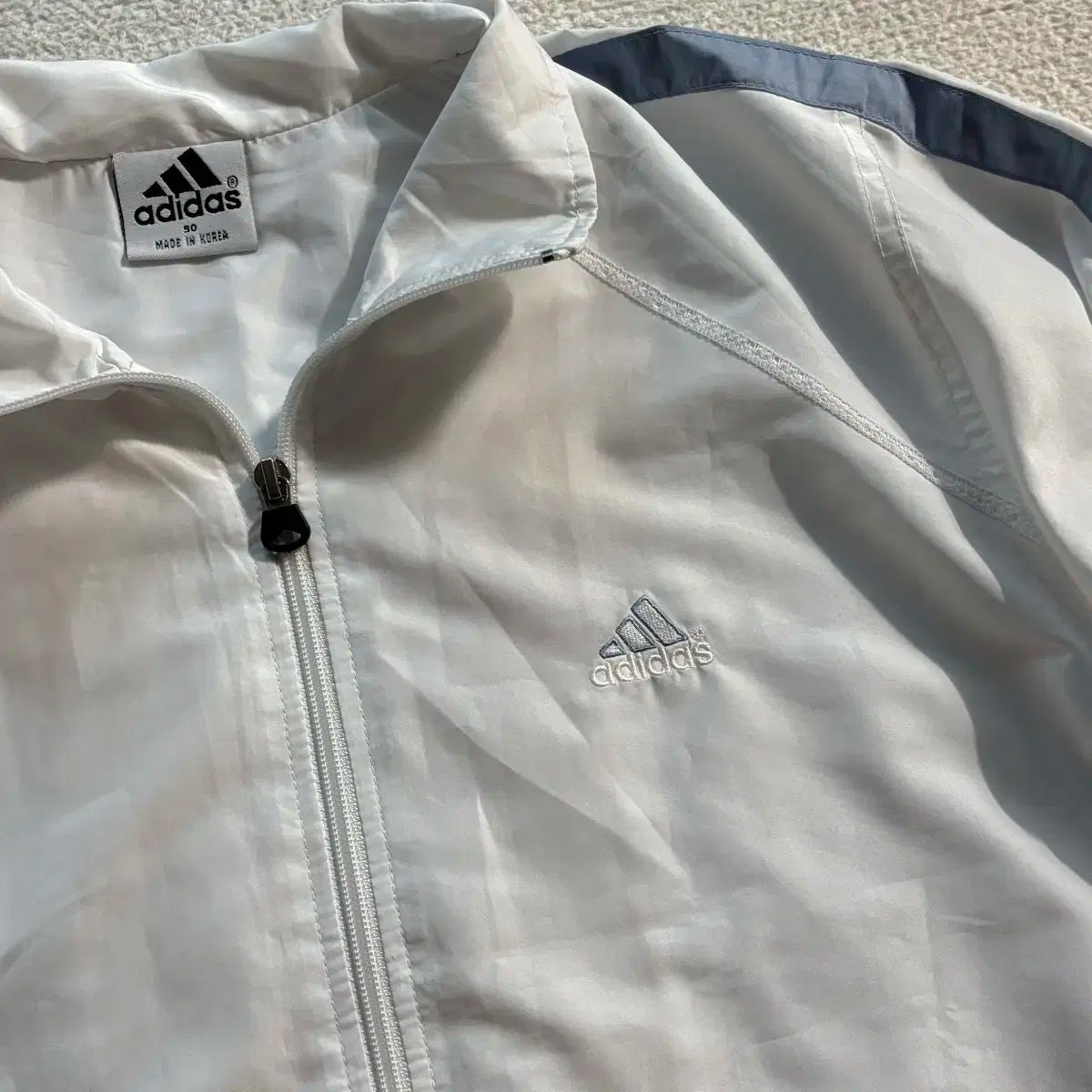 アディダス 必須アイテム スクール シナモロール 白 ウィンドブレーカー