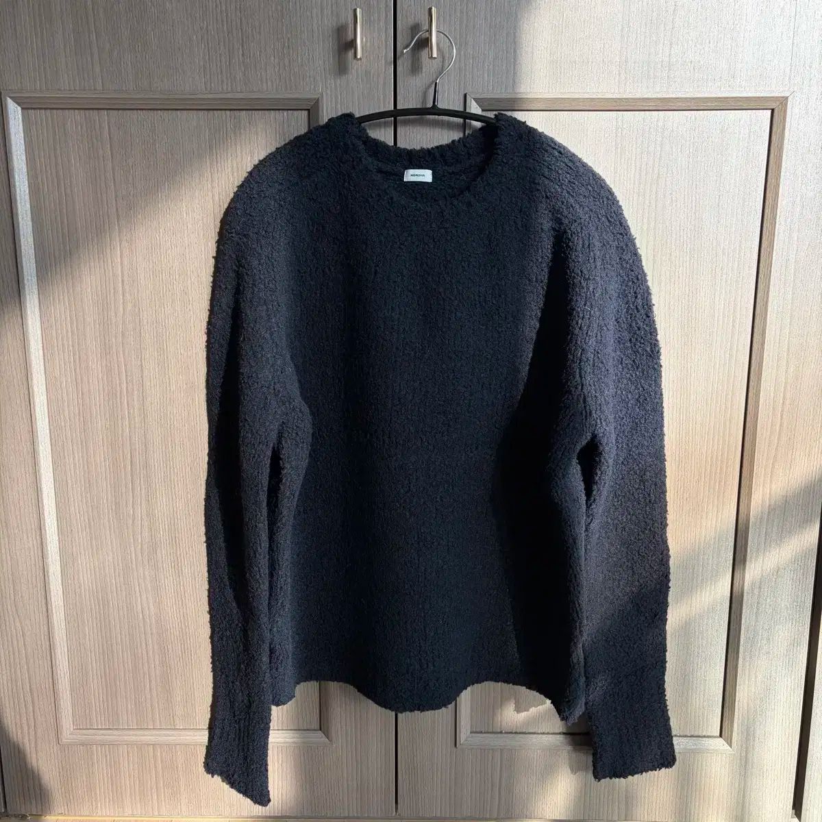 モノハ ウール ブークレ ニット ネイビー