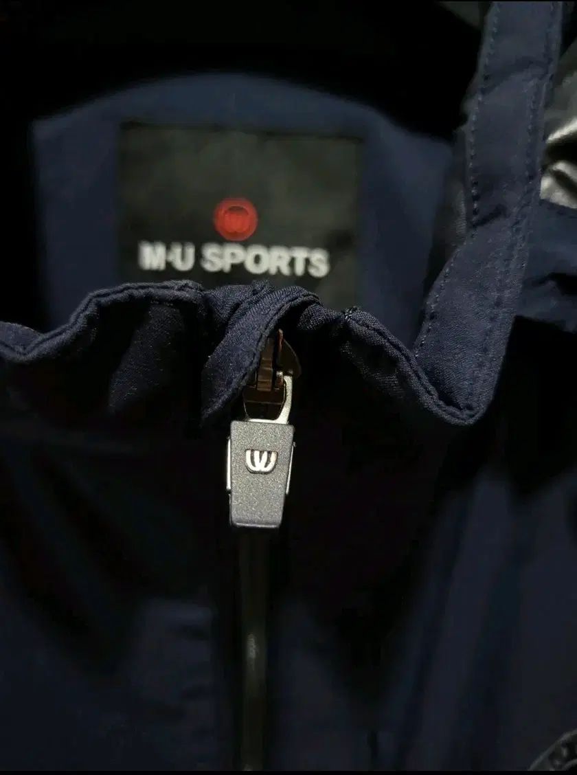 エムユースポーツ ウィンドブレーカー ジップアップ 105 LLC-HASEGAWATOSO_COM