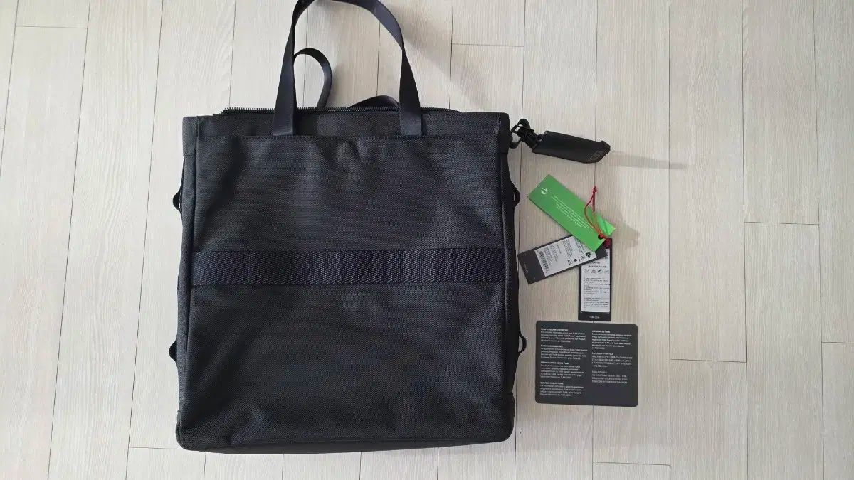 トゥミ アルファブラボー リーエゾン トートバッグ