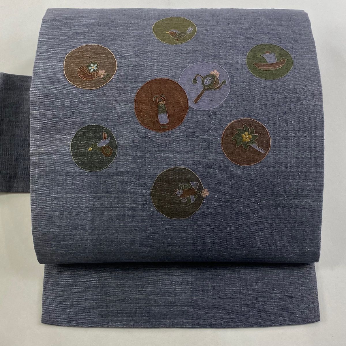 名古屋帯 秀品 紬地 玩具 刺繍 金糸 灰色 正絹