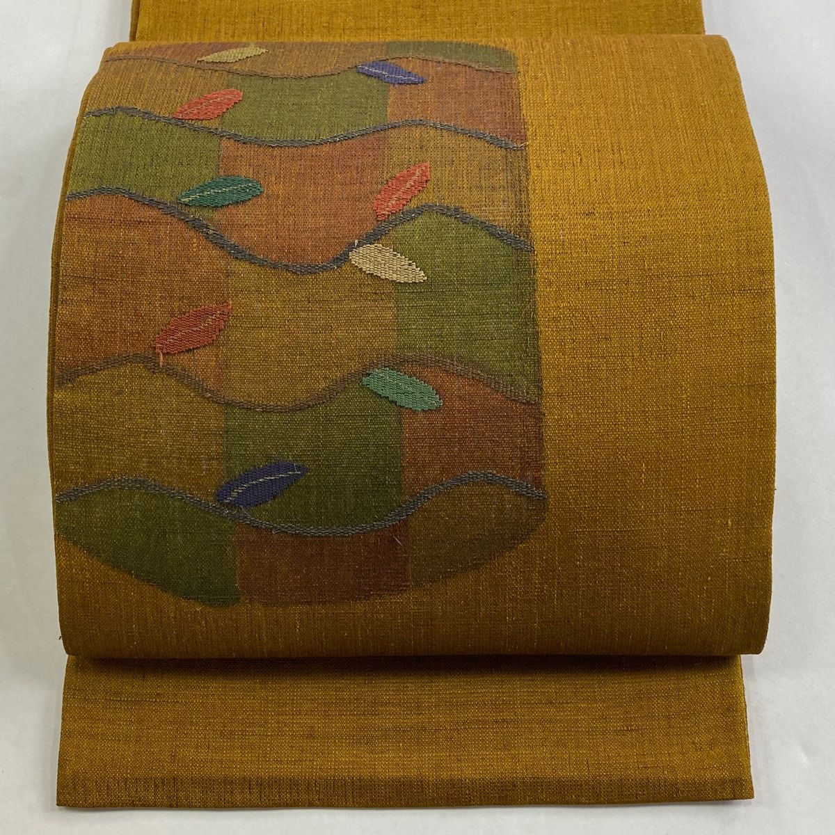 袋帯 秀品 葉柄 幾何学模様 金糸 山吹茶色 お太鼓柄 正絹