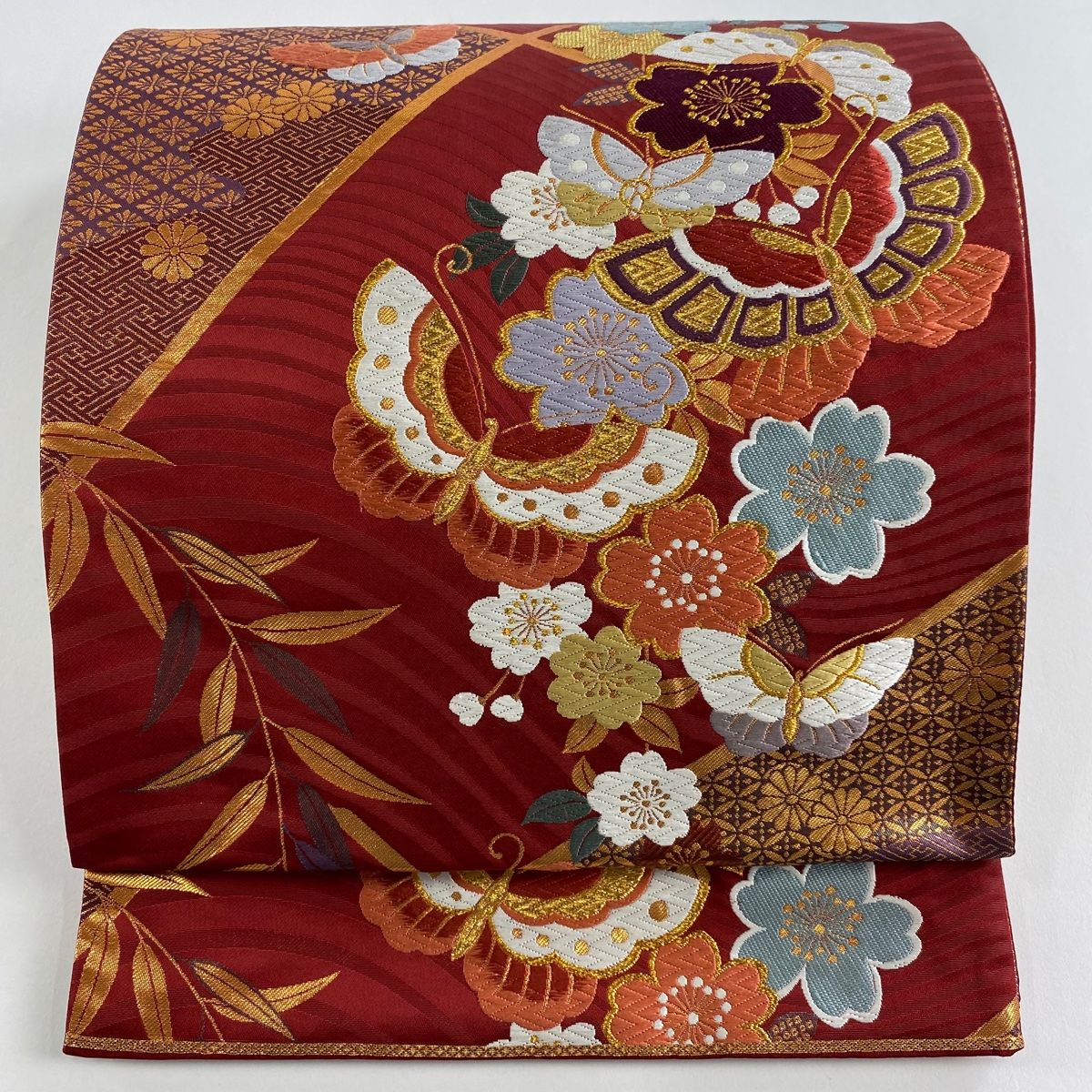 袋帯 秀品 蝶 桜 金糸 箔 えんじ色 全通 正絹
