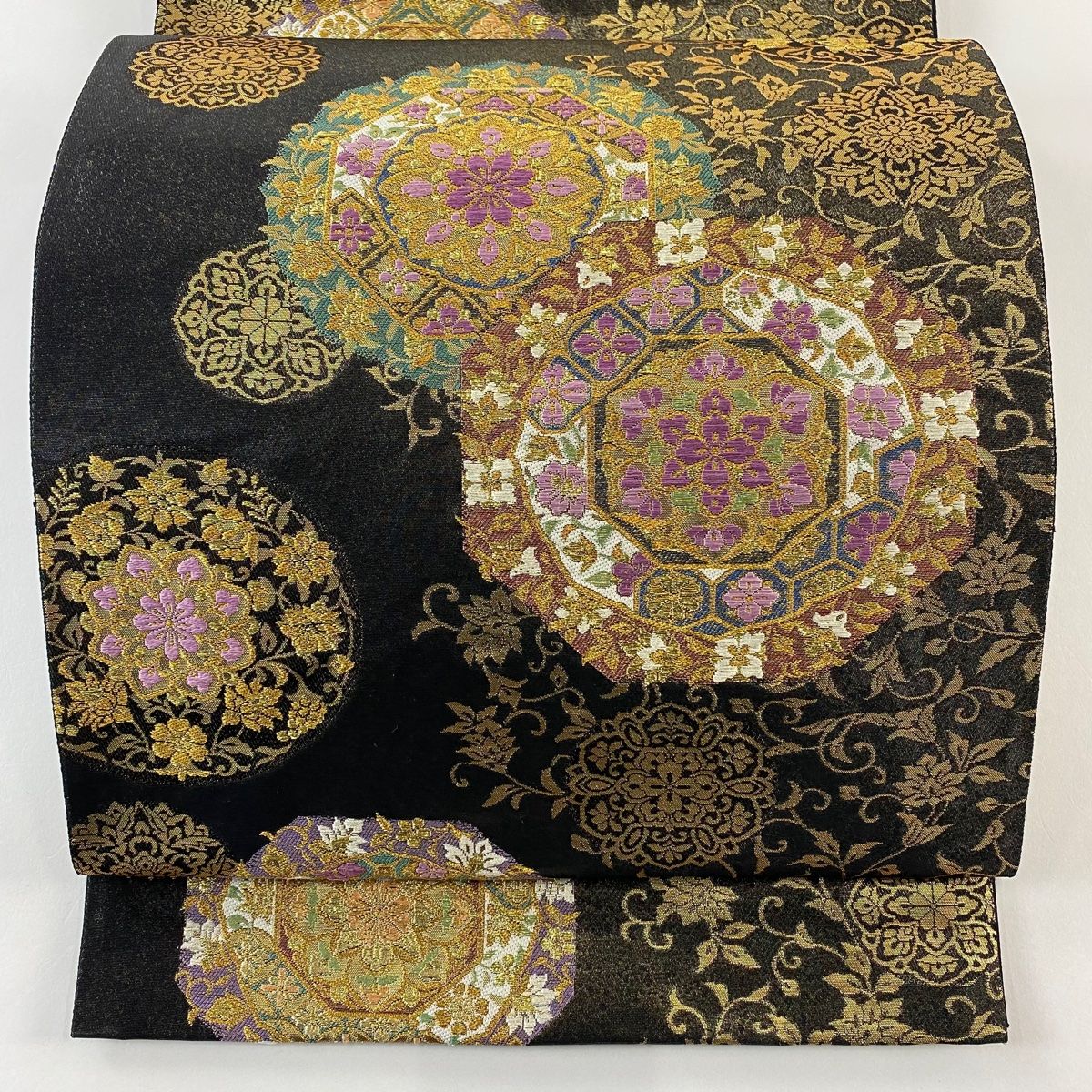袋帯 じゅらく 落款 帝王紫 華文 花唐草 金糸 箔 黒 お太鼓柄 正絹