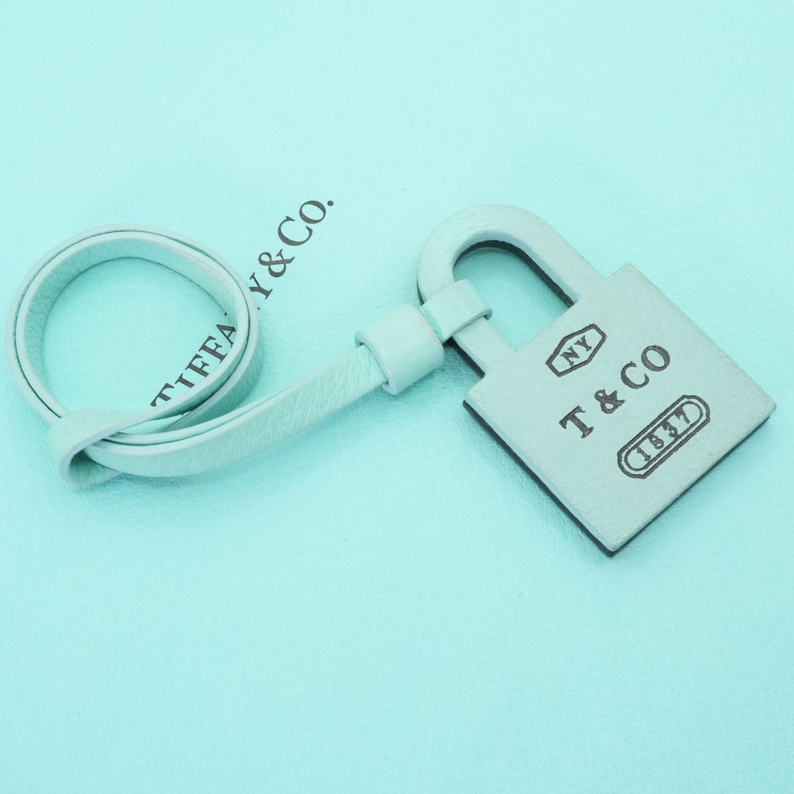 ティファニー カーフスキン レザー ロゴ バッグ チャーム 25-2005M