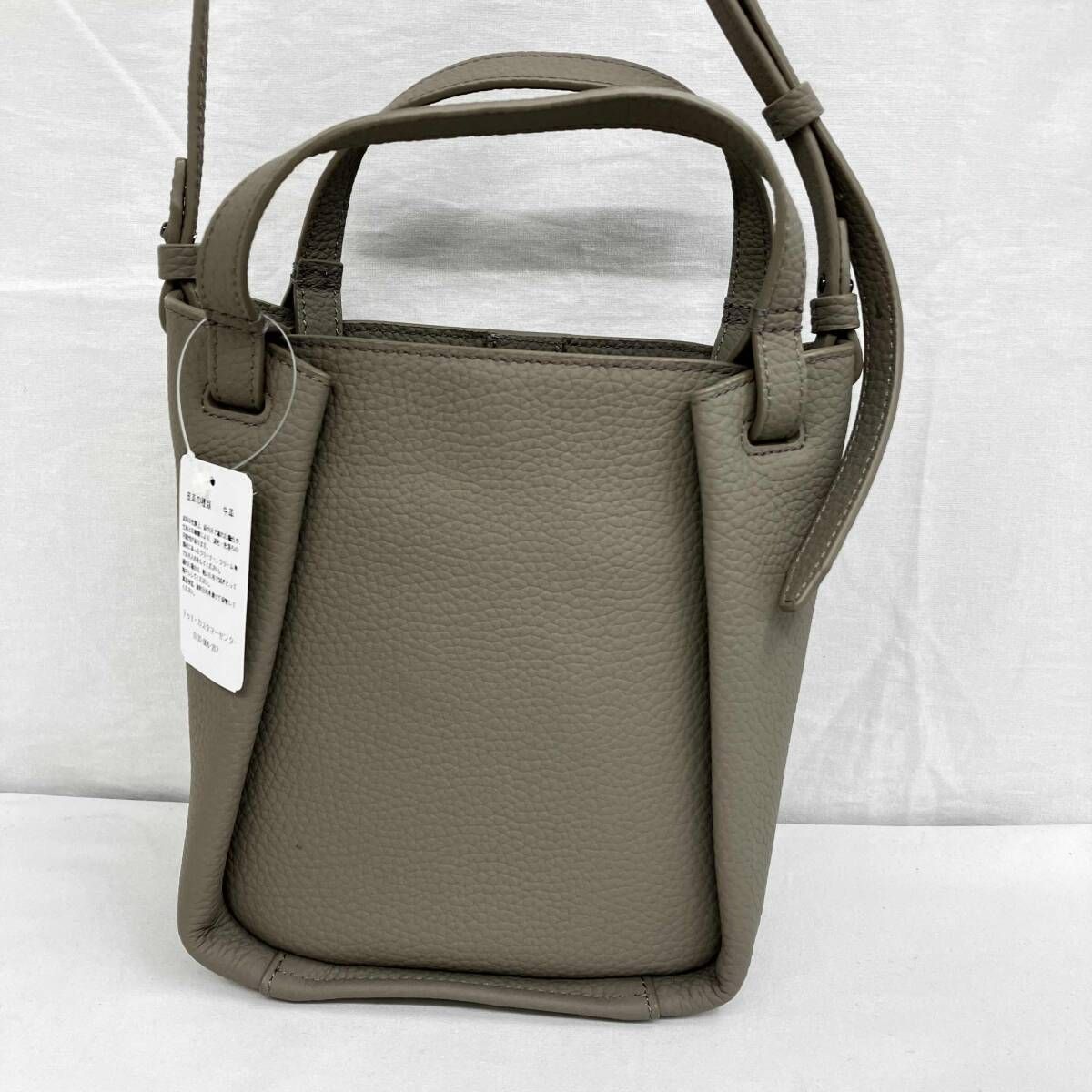 TUMI トゥミ Valorie Crossbody 152451-1853 ショルダーバッグ グレーベージュ