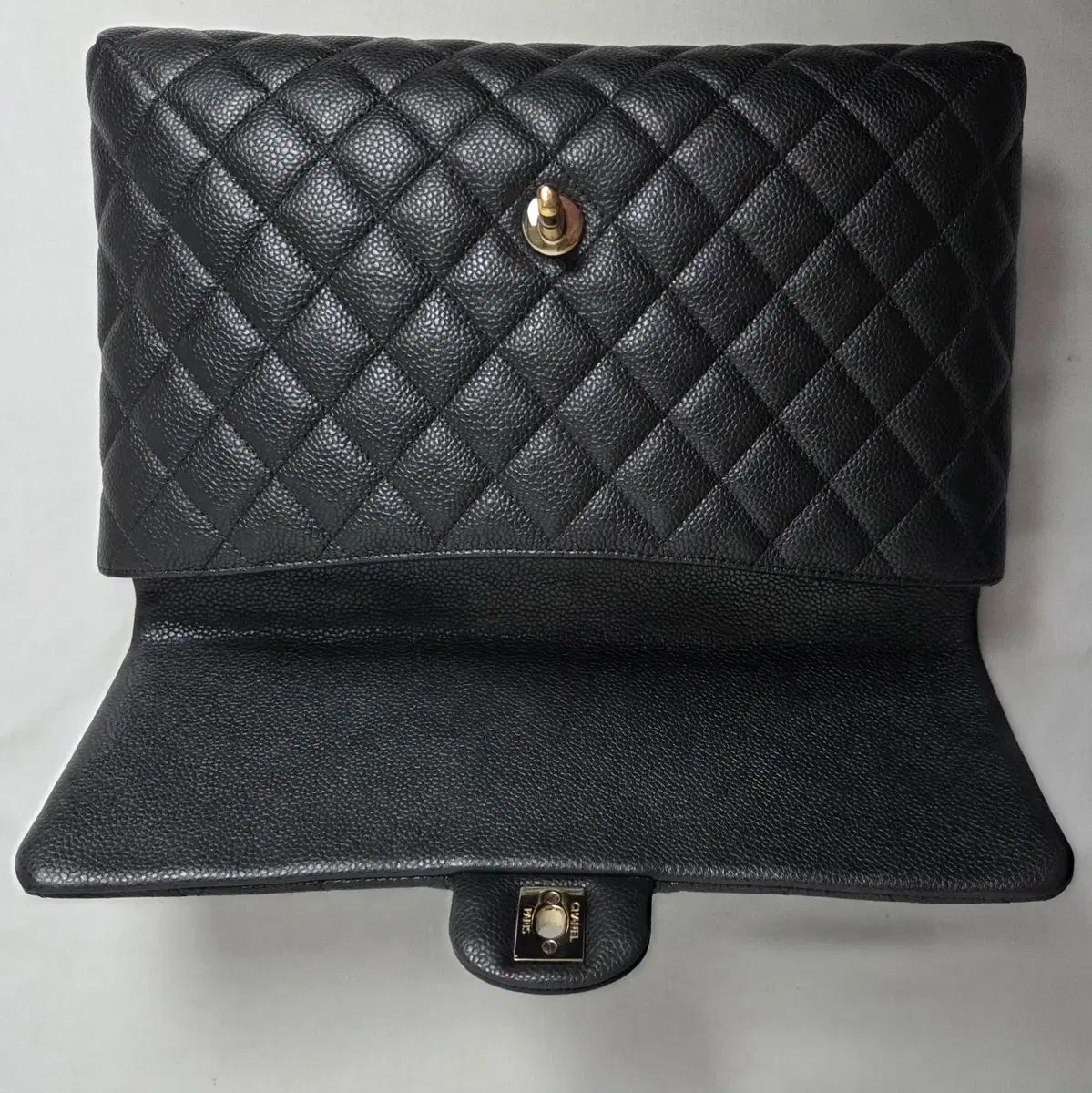 フラップクラッチバッグ キャビア