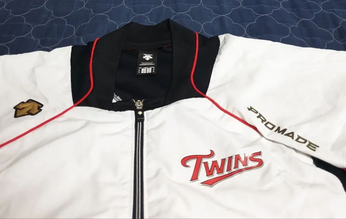 デサント LG TWINS 半袖 ウィンドブレーカー 白 105