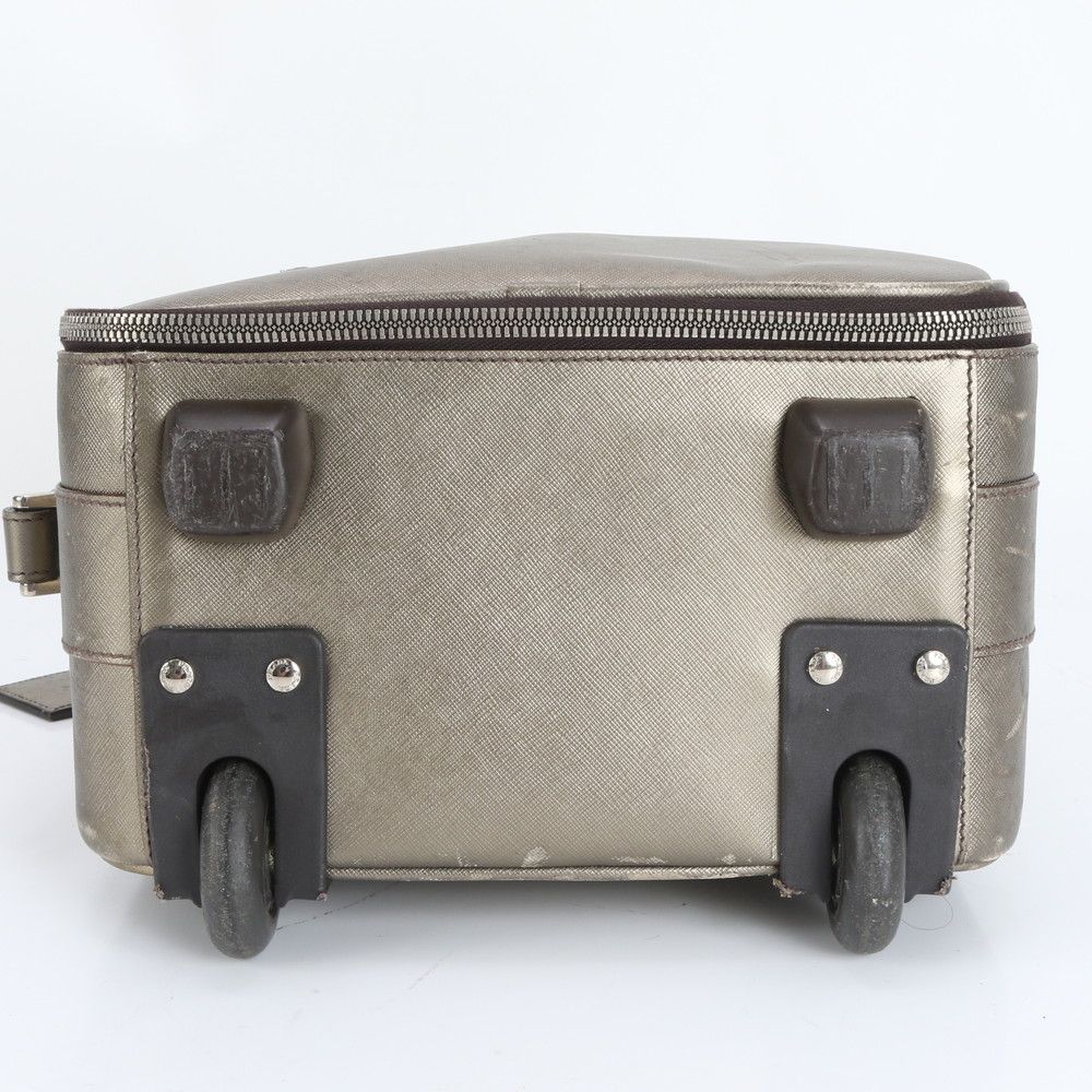 三角ロゴ スーツケース