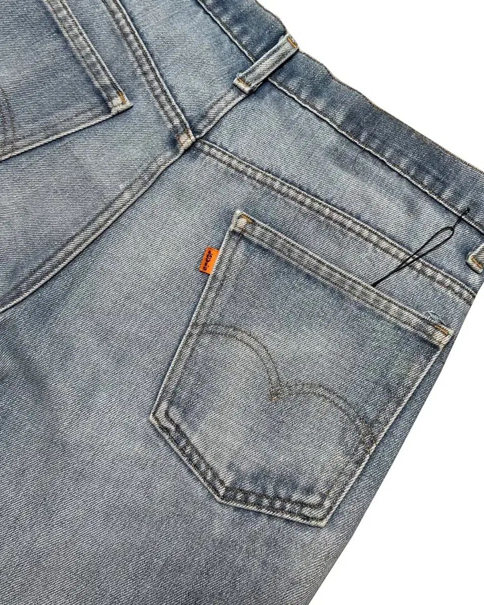 ブーツカット オレンジタブ